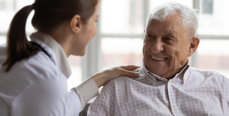 Caring geriatric nurse