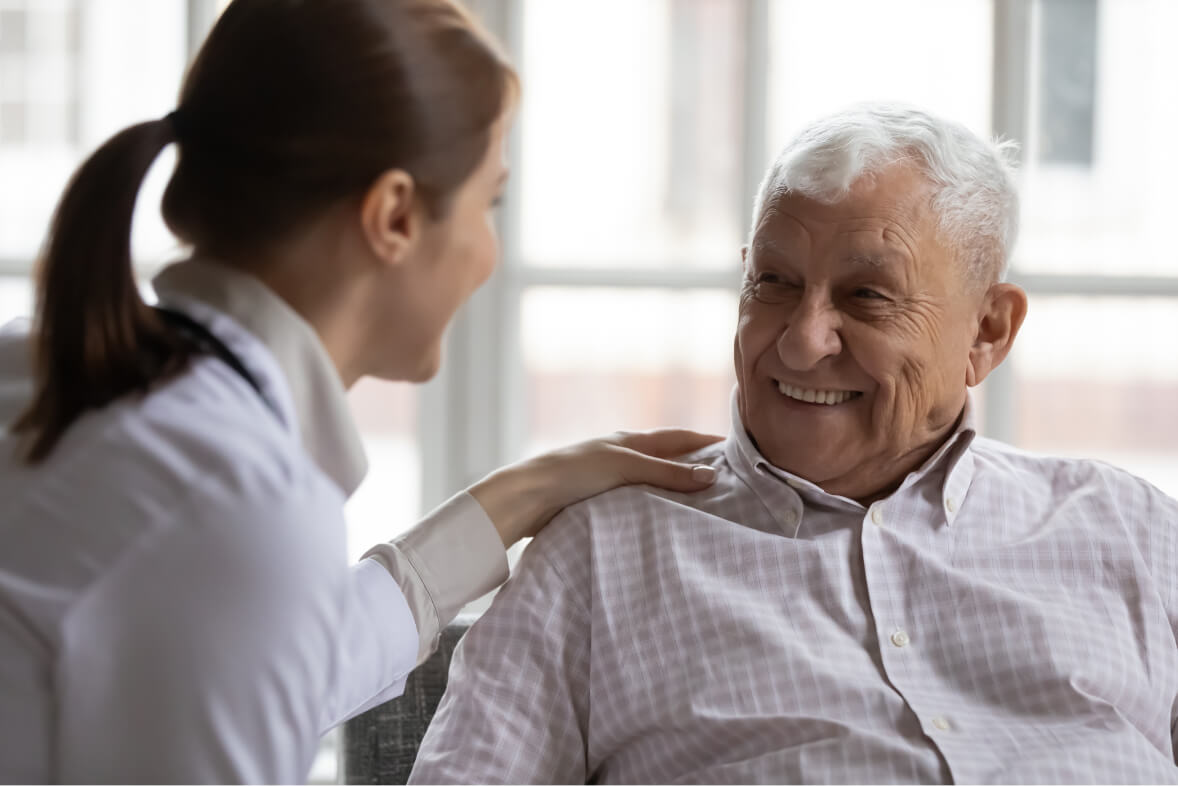 Caring geriatric nurse