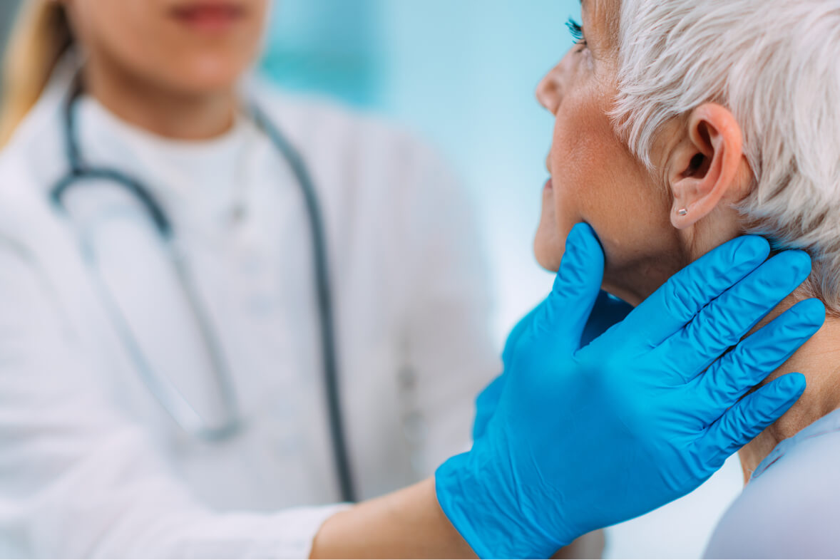 Endocrinology Doctor Examining Senior Woman
