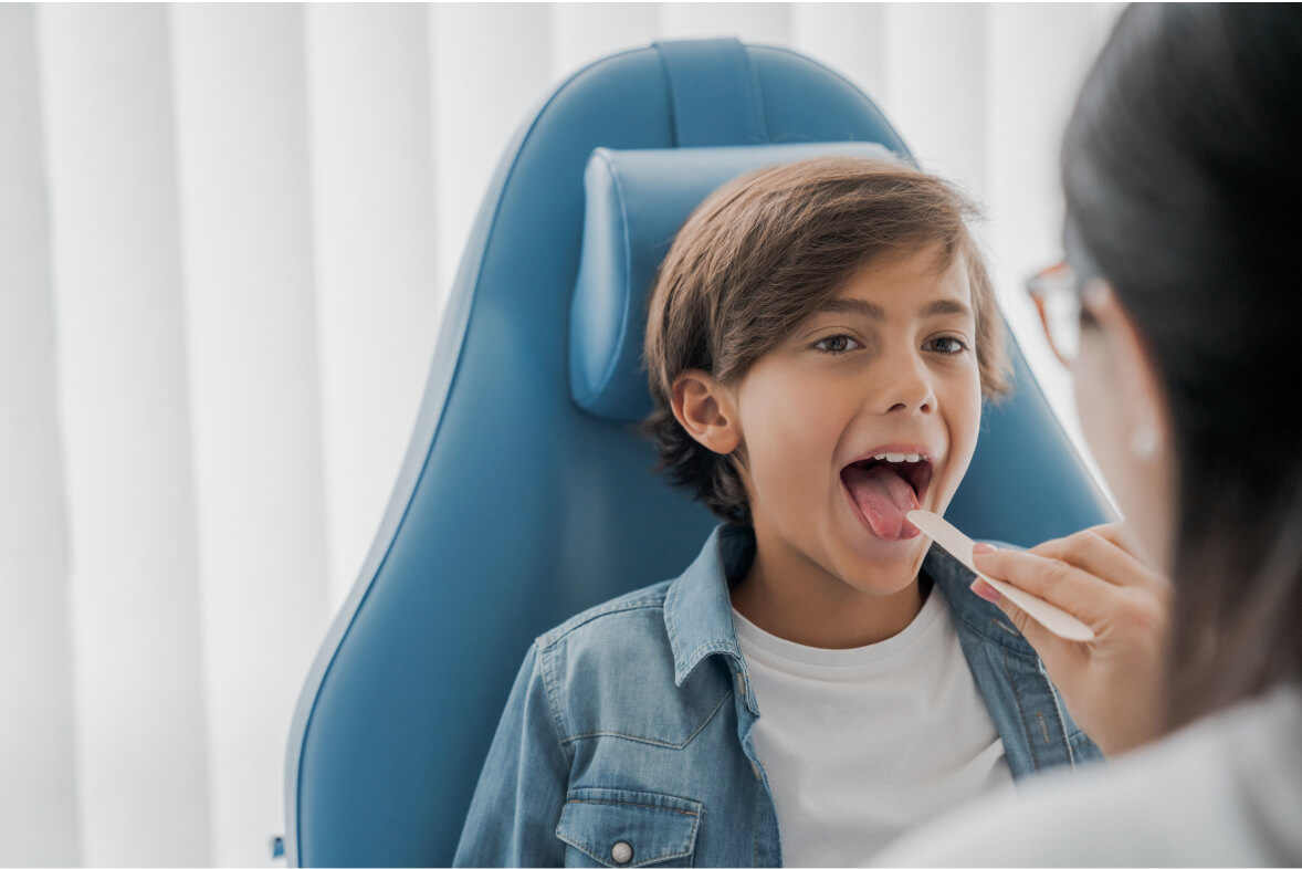 Otolaryngologist examines boy's throat, ENT, Ear Nose and Throat, Doctor with Child, Physician with Child