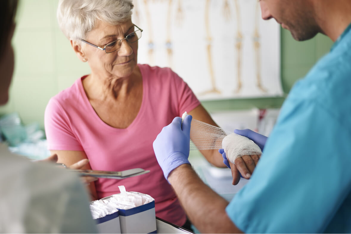 Senior woman with bandage on the hand