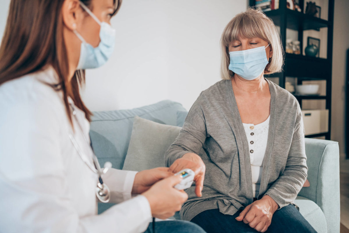 Female doctor at home visit.