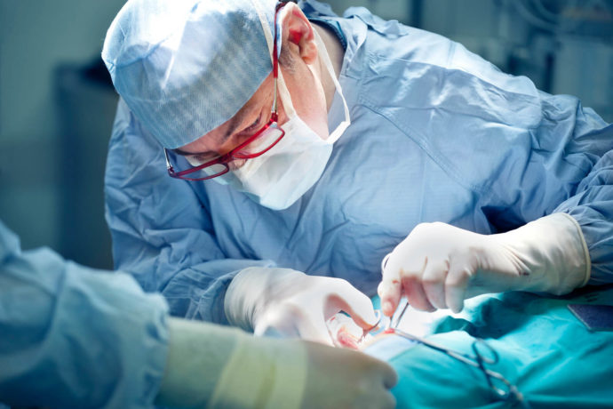 Surgeon performing surgery