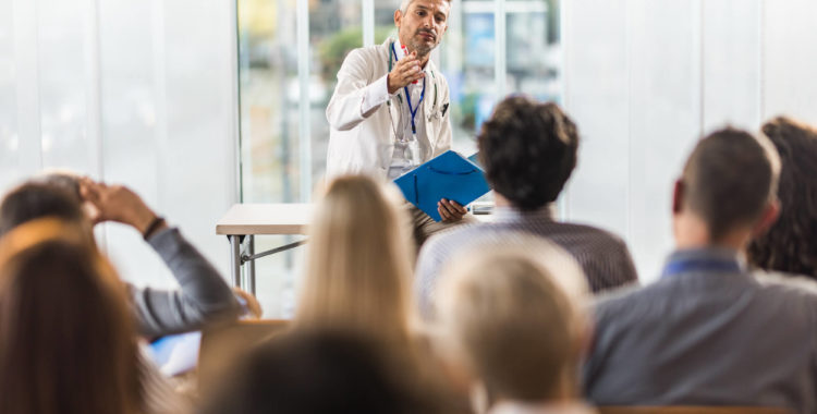 Provider talking to a group of people