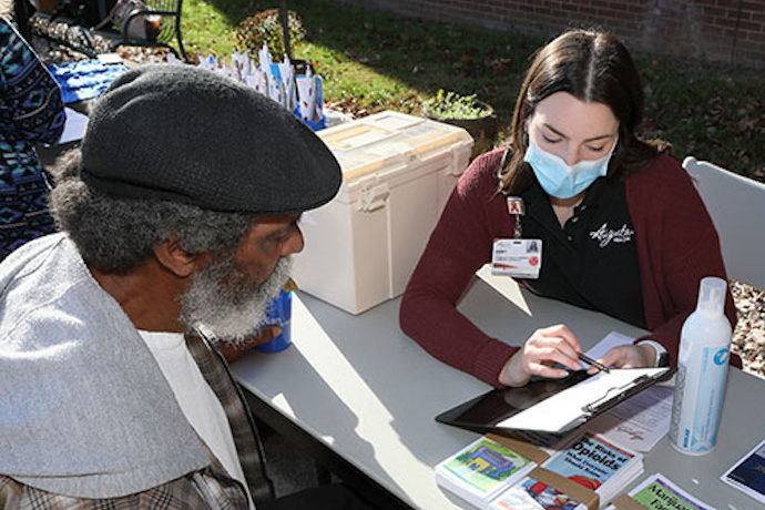 provider helping a patient