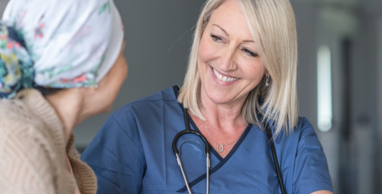 Female doctor consults patient with cancer