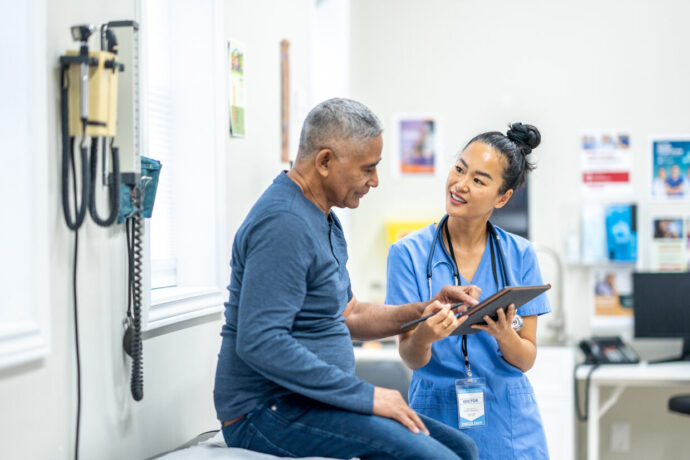 resident, resident helping patient