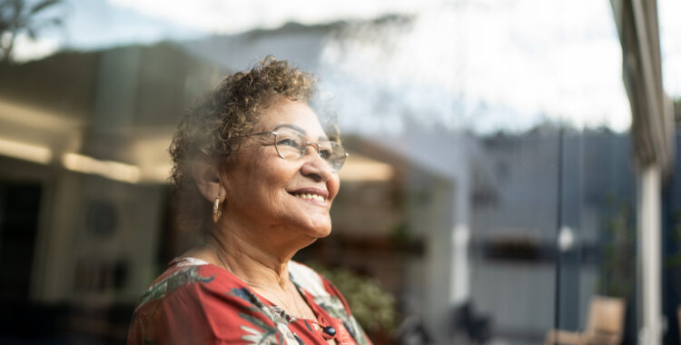Senior woman contemplating at home