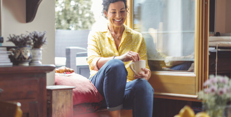 Mid adult woman at home