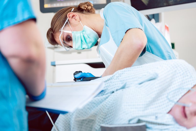 Doctor performing a colonoscopy procedure
