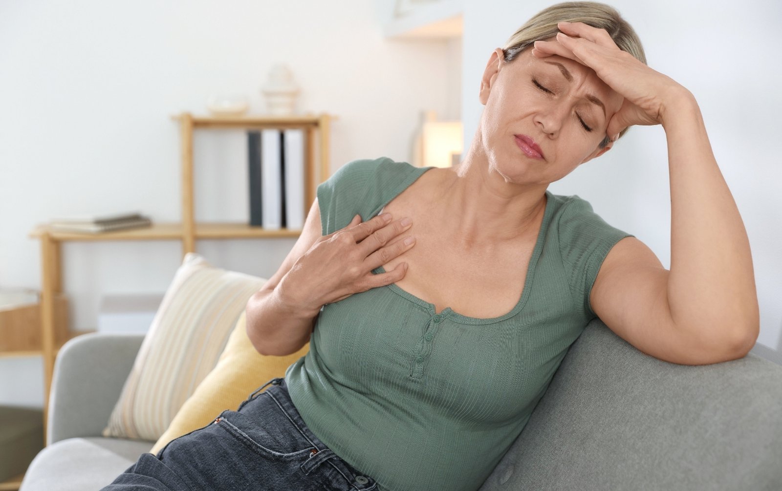 Woman experiencing hot flashes