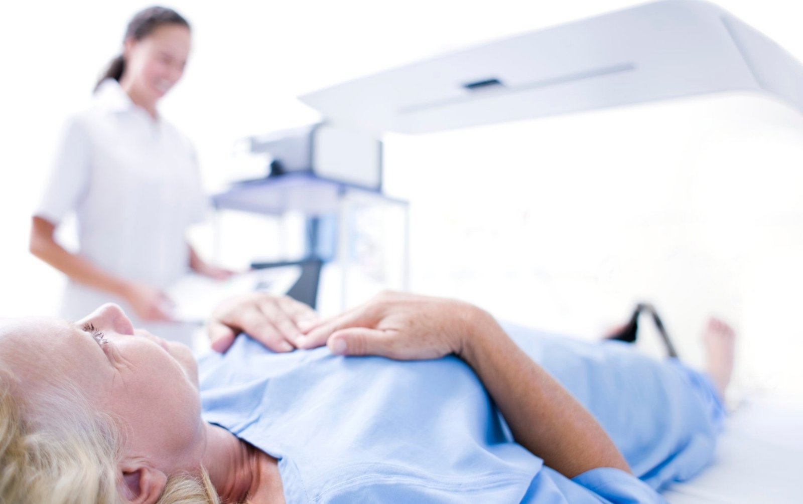 Woman undergoing a bone density test, bone health in women