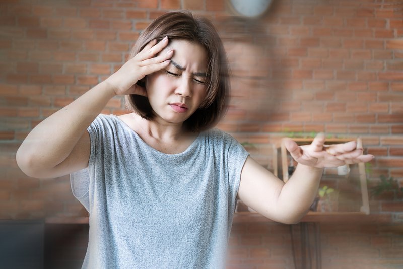 Young woman with sudden intense headache