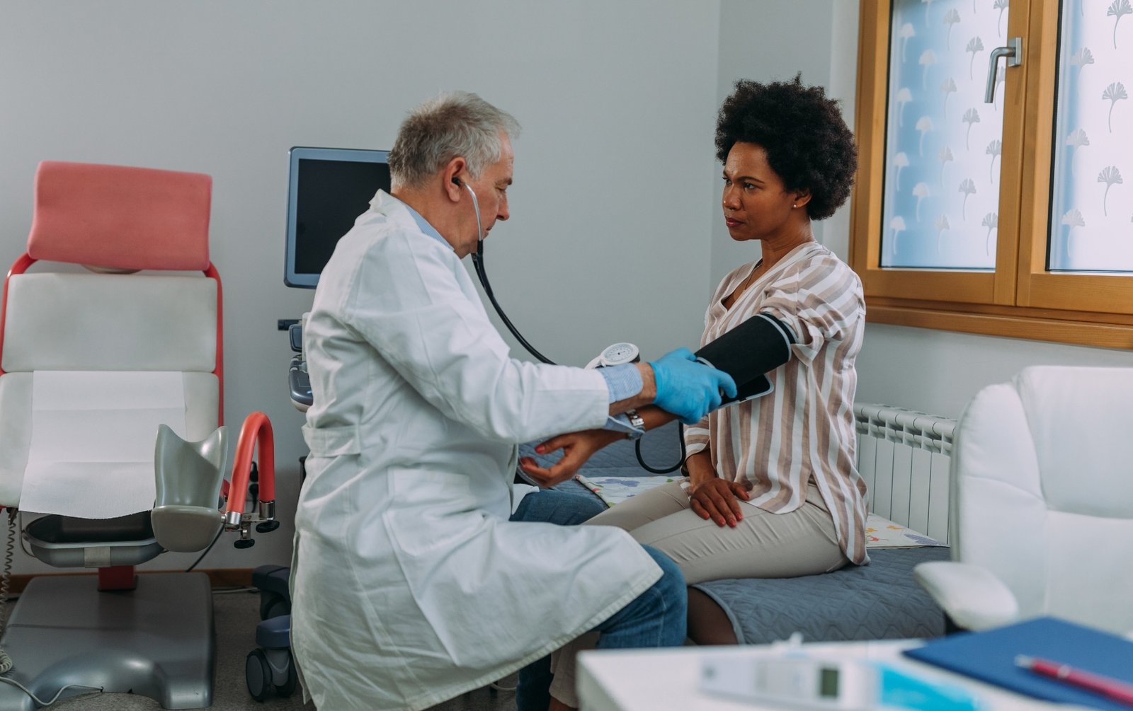Woman visiting her primary care provider