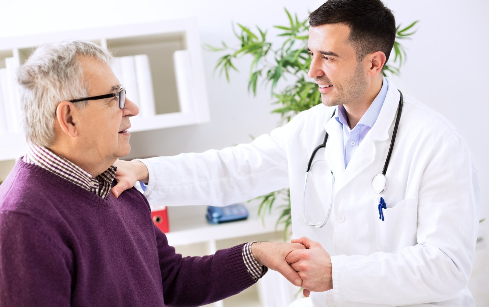 Patient and doctor talking about fall prevention interventions