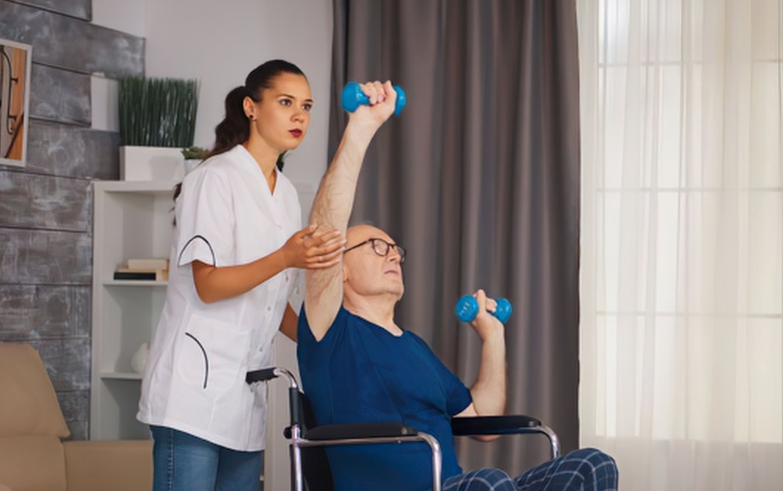 Man doing home physical therapy with PT