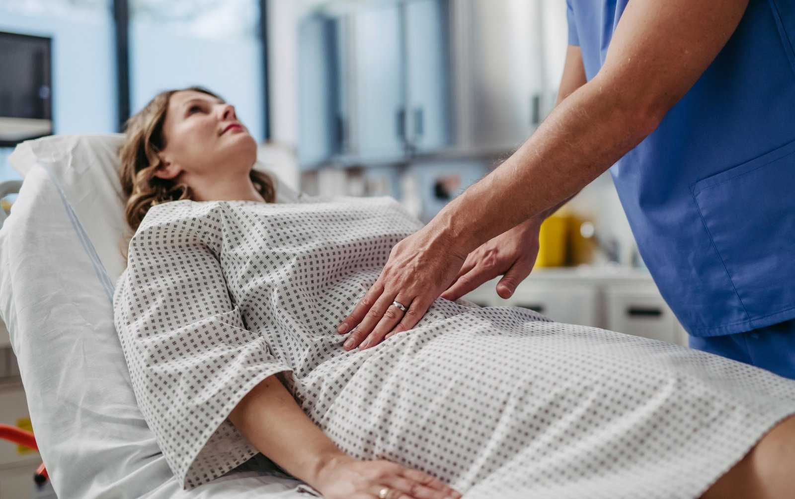 Woman getting her stomach tested