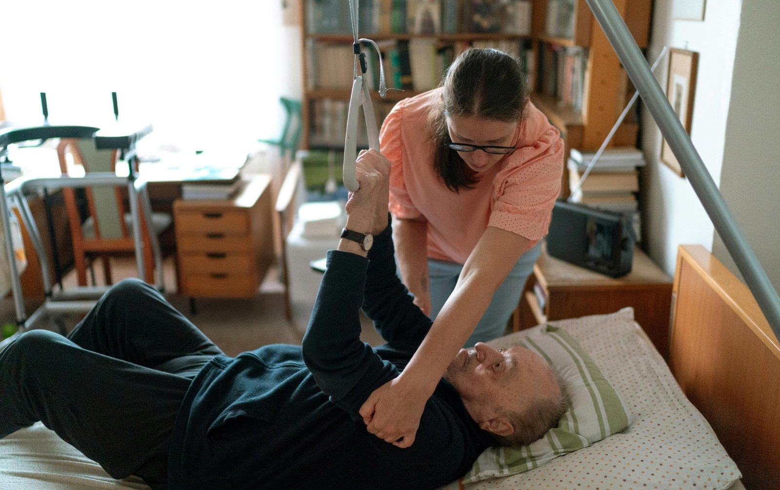 Woman caring for an aging parent