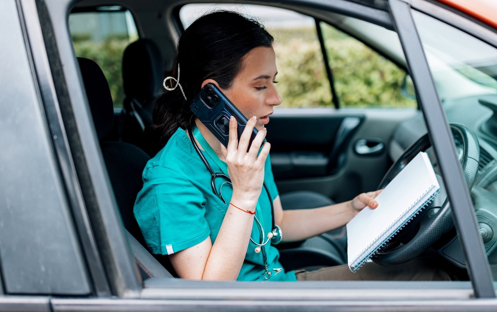 Woman scheduling an appointment while caring for aging parents