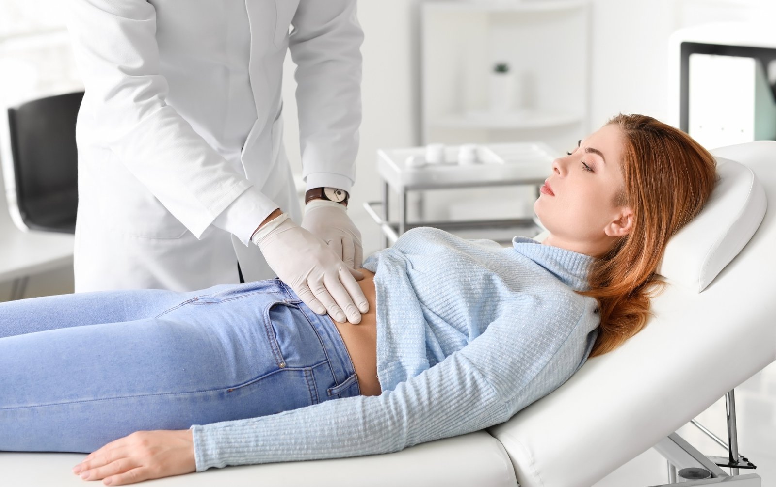 Woman undergoing a checkup with her primary care provider